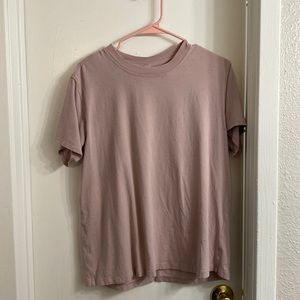 Lululemon loose fitting athletic tee. Has been worn but no damages.